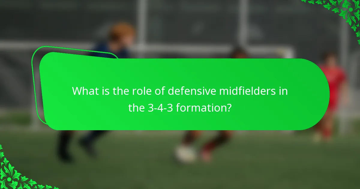 What is the role of defensive midfielders in the 3-4-3 formation?